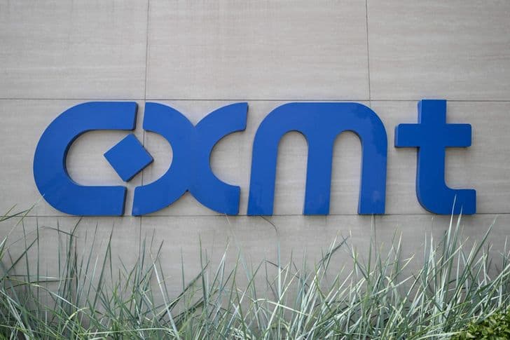The CXMT logo displayed on a wall outside a company building