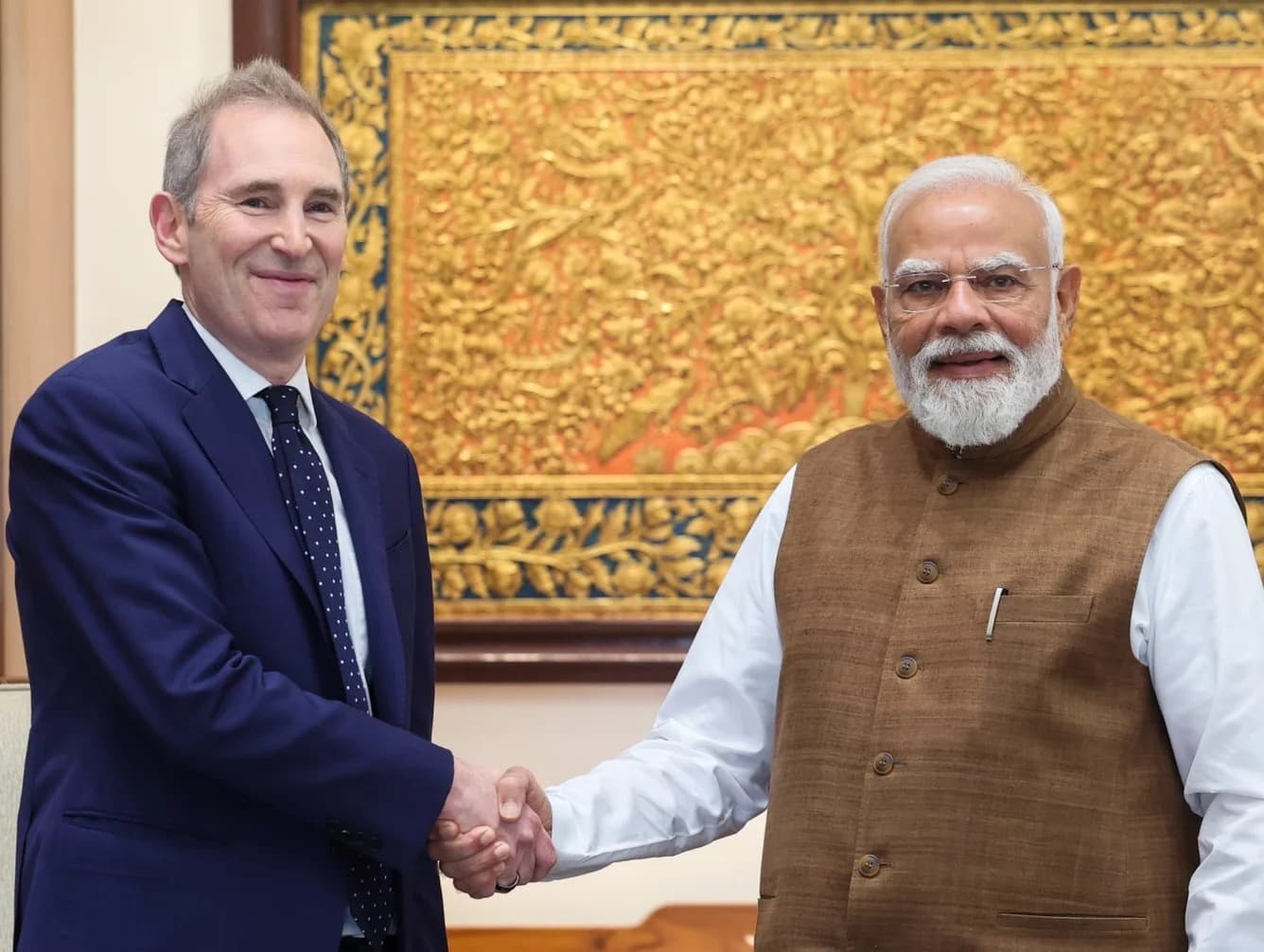 Amazon chief executive Andy Jassy shaking hands with Indian Prime Minister Narendra Modi