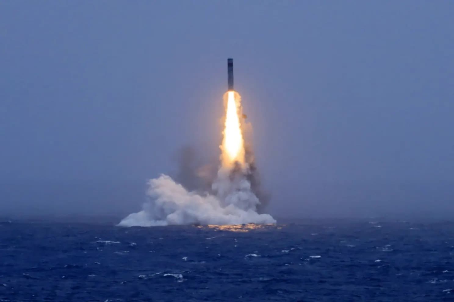 A submarine launched ballistic missile breaks the ocean surface during a test