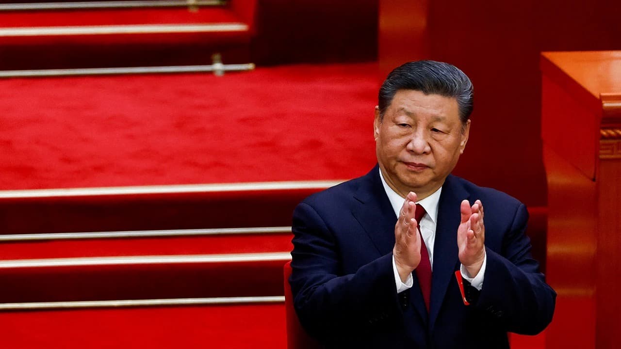 Chinese President Xi Jinping applauding at a state ceremony